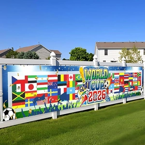 2026 Football World Cup decorative outdoor banner with flags and trophy on white fence