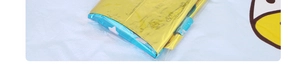 Detail of metallic gold and sky blue foil balloon showing reflective material and texture
