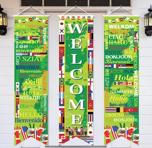 Detailed outdoor welcome banners featuring global flags and multi-language greetings decoration
