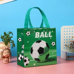 Green non-woven football gift bag with ball print for soccer themed party favors