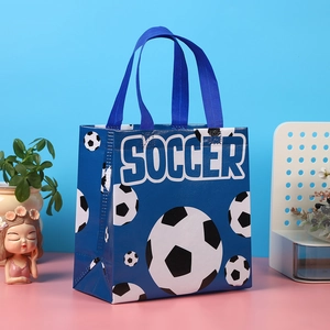 Blue non-woven soccer gift bag with football patterns and durable webbing handles