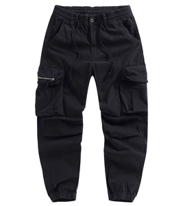 Detail of men's black cargo pants showing elastic waist with drawstring and side zip pockets