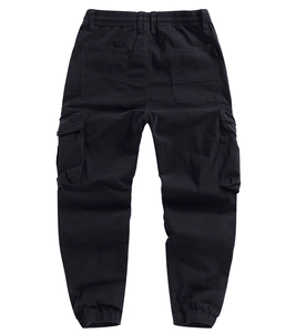 Detail view of black cargo pants featuring elastic cuffs and large rear utility pockets