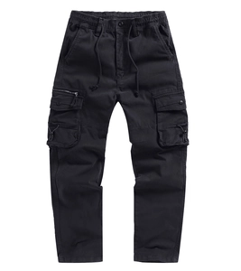 Detailed close-up of tactical cargo pants showing functional pockets and metal zipper detail