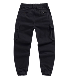 Rear view of black cargo pants showing elastic waist, flap pockets and cuffed hems