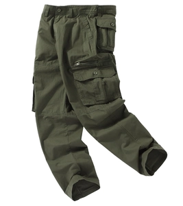 Detailed view of durable army green cargo pants featuring large utility pockets and fabric texture
