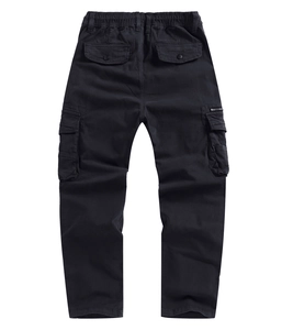 Detail view of black cargo pants with multiple pockets and metal zipper decoration