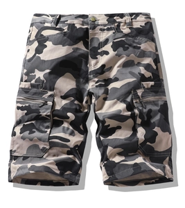 Detail of cargo shorts featuring camouflage pattern and multi-pocket functional design