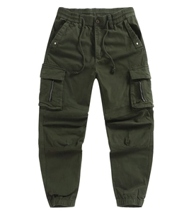 Detail view of olive green cargo pants featuring flap pockets with decorative zippers
