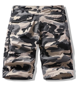 Detail view of the back pockets with flat flaps on grey camouflage cargo shorts