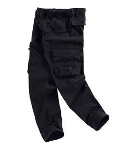 Detailed close-up of multi-pocket cargo pants showing durable fabric and flap button pockets