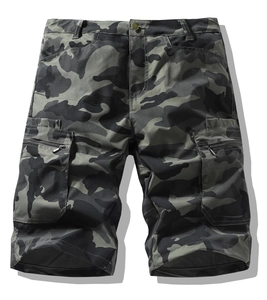 Detailed view of cargo pocket with zipper on camouflaged ripstop shorts for men
