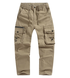Detail of khaki cargo pants featuring elastic drawstring waist and side bellows pockets