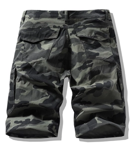 Detail view of cargo shorts back pockets with classic jungle camouflage print pattern