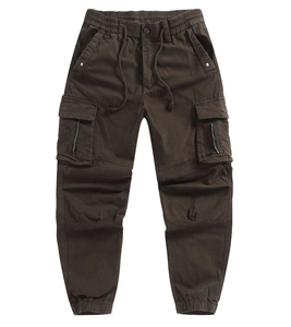 Detail view of cargo pocket with zipper on dark brown cuffed drawstring pants