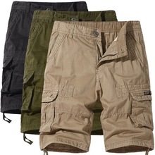 Detail of cargo shorts showing multi-pocket design and adjustable drawstring hem cords