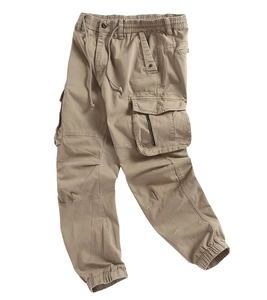 Detail of tan cargo pants featuring elastic drawstring waist and multi-pocket design