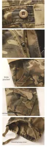 Detail view of washed camo cargo pants showing copper zipper, buttons and drawstring hem