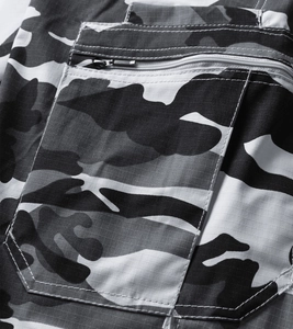 Detail of ripstop camouflage fabric with durable metal zipper and white double stitching