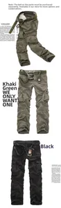 Detail view of multi-pocket cargo pants in khaki and black with zipper accents