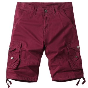 Detail of burgundy cargo shorts showing side flap pockets and sturdy metallic buttons
