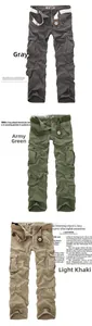 Vertical view of three colors of men's multi-pocket cargo pants with belts on newspaper background