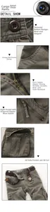 Detail showing the heavy-duty copper zipper and multi-pocket design on cargo pants