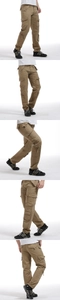 Detailed close-up of khaki cargo pants with functional side pockets and premium cotton fabric