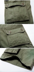 Detail view of army green cargo shorts showing reinforced pockets and stitching
