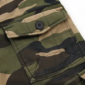 Mens winter thick camo cargo pants with warm fleece lining and tactical flap pocket detail