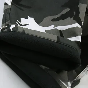 Winter heavy camouflage cargo pants featuring warm black fleece lining for extra insulation