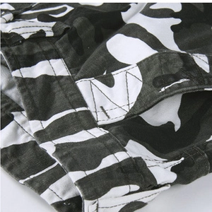 Men's loose camo cargo pants with reinforced pocket flap and double stitching detail