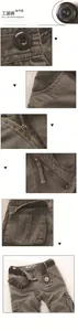 Detailed macro view of solid copper zipper and durable buttons on men's cargo pants