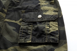 Detail view of cargo pocket on camouflage shorts with reinforced double stitching