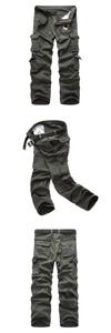 Detail view of military green cargo pants featuring multiple flap pockets and canvas belt