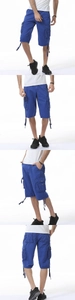 Detail view of royal blue cargo shorts with multi-functional pockets and side drawstring