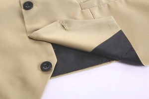 Close-up of khaki suit vest showing twill fabric texture, black button, and inner lining