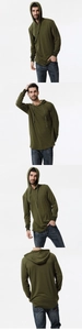 Détail d'un t-shirt à capuche vert olive avec cordon réglable et ourlet arrondi mode