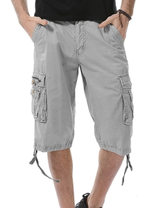 Men's loose cargo shorts in light grey featuring multiple pockets and adjustable drawstring cuffs