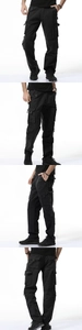 Detail view of multi-pocket black tactical cargo pants with reinforced stitching for men