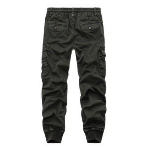 Slim fit men's cargo joggers in olive green with drawstring waist and ribbed cuffs