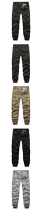 Detail of cargo jogger pants featuring utility pockets and elastic drawstring waistline