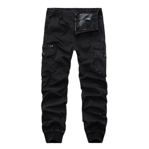 Detail view of black camo cargo joggers featuring multi-pocket design and elastic drawstring waist
