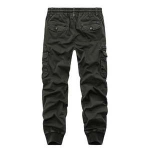 Classic olive green elastic cargo pants with large pockets and ribbed cuffs from the back