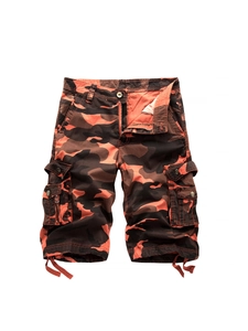 Men's camouflage cargo shorts in orange and black pattern with multi-pocket utility design