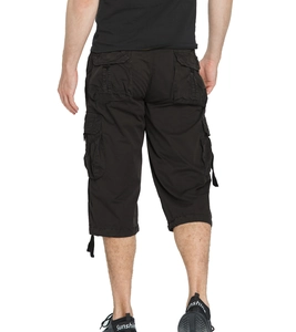 Close-up of durable black cargo shorts featuring functional large rear flap pockets for men