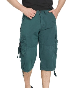 Detail view of cargo capri pants with deep teal cotton fabric and utility side pockets