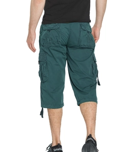 Rear view detail of dark green cargo capri pants with large pockets and adjustable cuffs