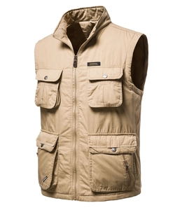 Detail of khaki multi-pocket outdoor vest with durable canvas texture and metal snap buttons