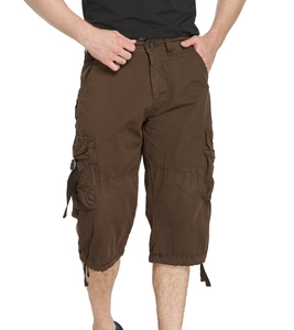 Detail view of cargo shorts showing durable textured fabric and large side flap pockets